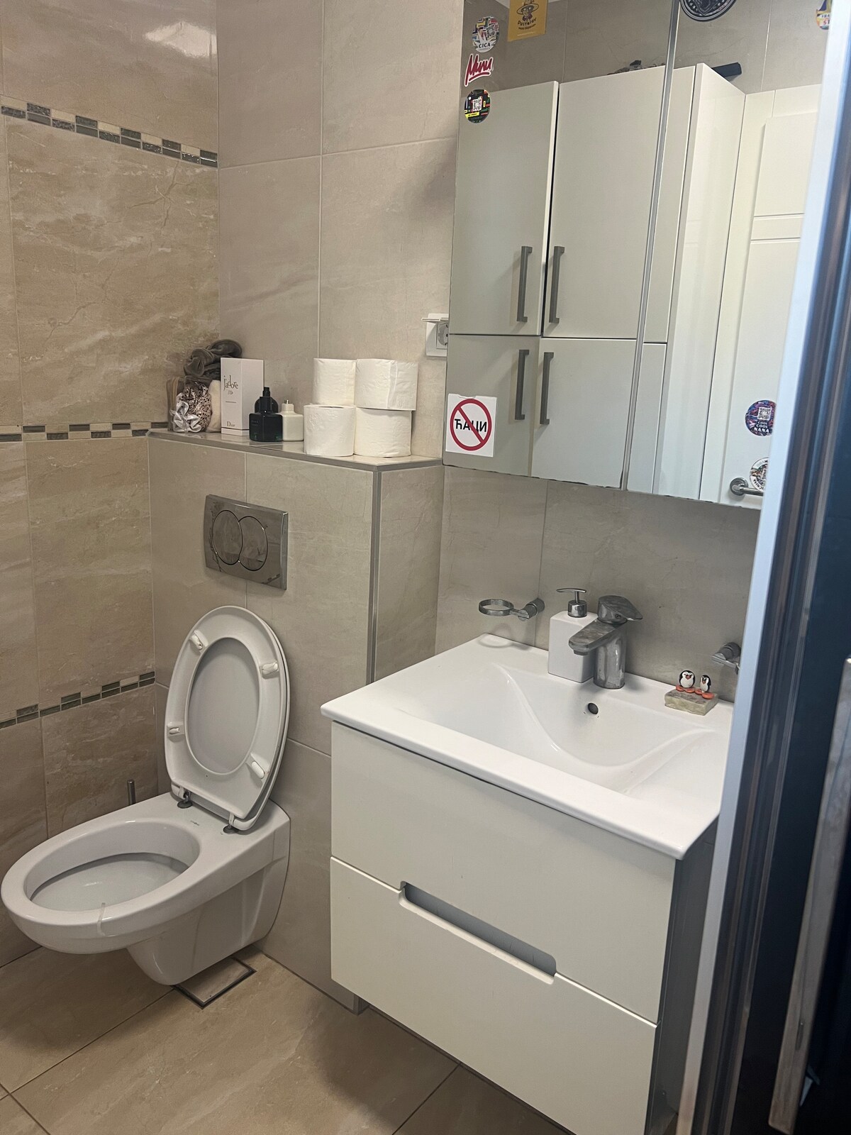 Clean modern bathroom with a vanity and mirror